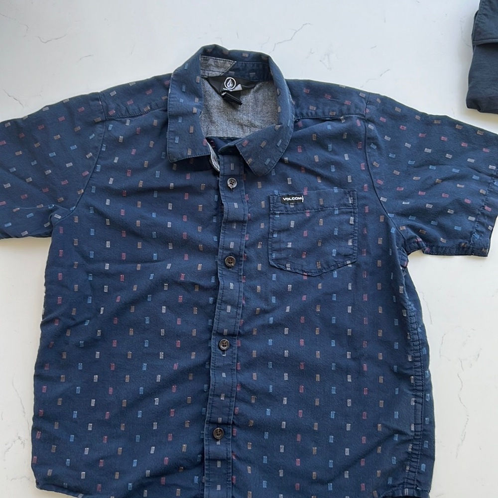 Shirt sleeve button down.